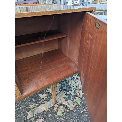 310 - Beautility mid century sideboard. 4 drawers flanked by cupboards. W183.5cm W45cm H78cm