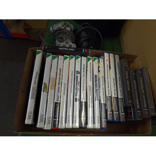 134 - PS2, with various PS2 games, also includes Wii games, various gaming guides, controllers & Zumba... 