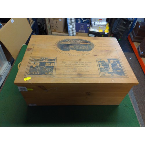 187 - Pine storage box with rope handles, printed to top with Thorntons Chocolate Heaven Since 1911W51 D35... 