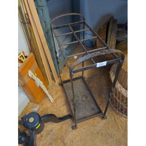 279 - Wrought metal umbrella stand with removable drip tray