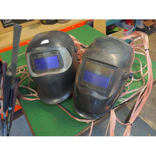 285 - 2 Welders masks, Vibration plate, golf clubs, speaker wire