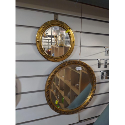 410 - Gilt framed bevelled mirror d. 40cm and port hole mirror d.26cm.
