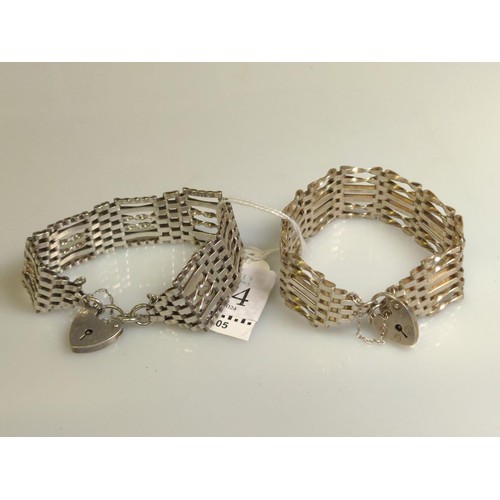 544 - Two hallmarked silver gate link bracelets with heart-shaped padlock clasps, gross weight 43.8 grams