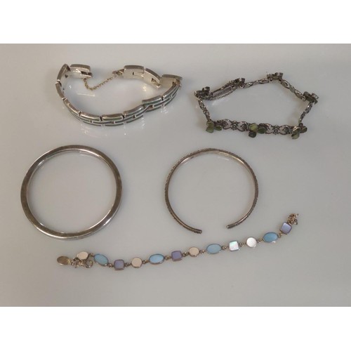 548 - Five silver bracelets, including a Charles Horner Chester 1922 hallmarked small / child's bangle, Ta... 