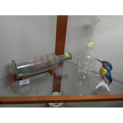 611 - Carl Ens porcelain kingfisher and two ships in bottles, including one with glass blown ship