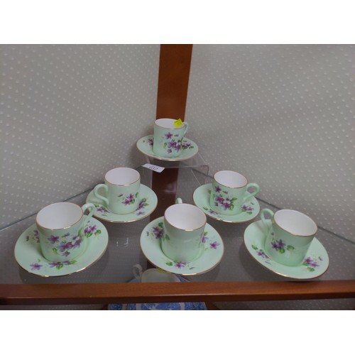 612 - Set of six Heathcote coffee cans and saucers