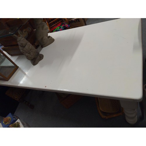 835 - Large white painted pine kitchen table raised on balustrade legs L244 x W106 x H78cm