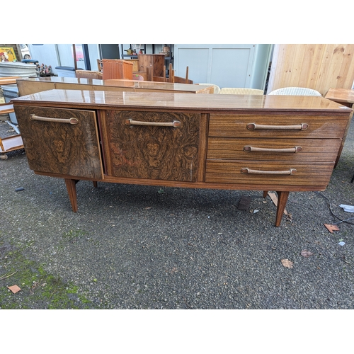 76 - Beautility walnut veneer effect sideboard, with single door, drop front and 3 drawers. W184cm D48cm ... 