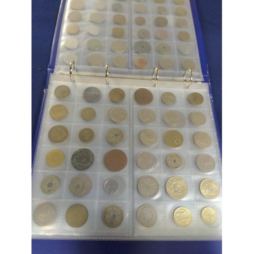 384 - Blue coin album containing mixed world coins, gross weight including album 1.53kg