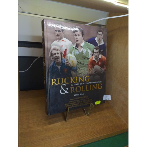 328 - Rucking and Rolling, 60 Years of International Rugby by Peter Bills, signed to both endpapers by Lei... 