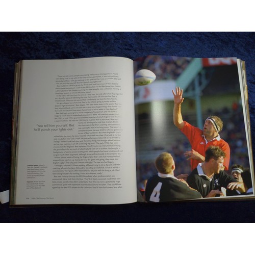 328 - Rucking and Rolling, 60 Years of International Rugby by Peter Bills, signed to both endpapers by Lei... 