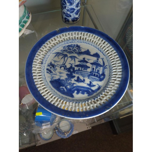 441 - Seven pieces of Chinese ceramics inc. a pair of plates. All with areas of damage or repair.