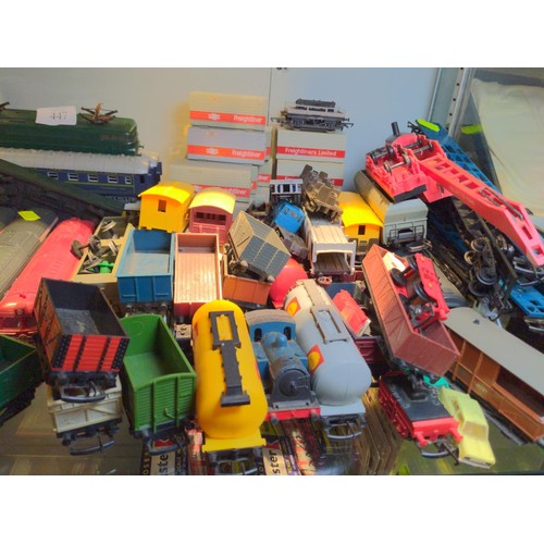 447 - Shelf of carriages, rolling stock and locos.