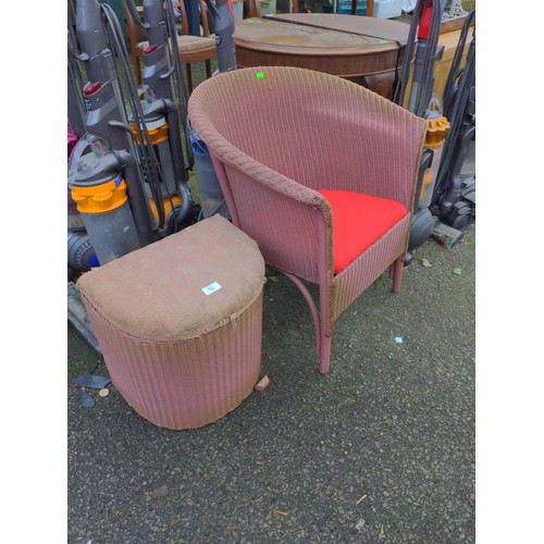 55 - Lloyd Loom style chair and a Lloyd Loom Lusty laundry basket, both in pink