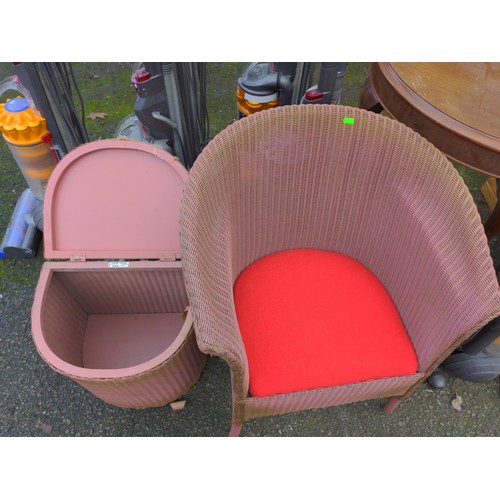 55 - Lloyd Loom style chair and a Lloyd Loom Lusty laundry basket, both in pink