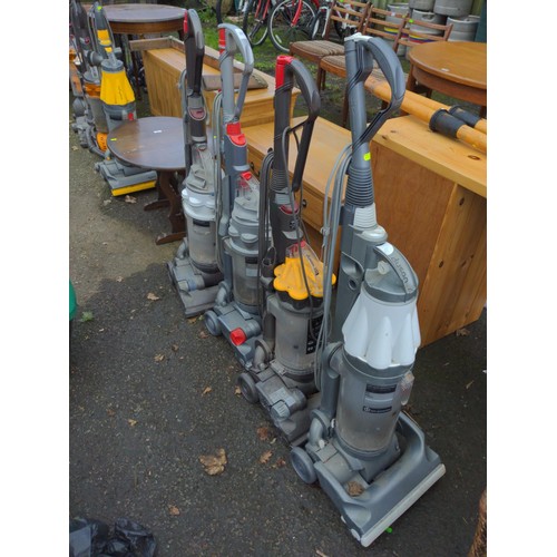 58 - Quantity of four Dyson vacuum cleaners. inc Dc7 2 x DC14 & DC33