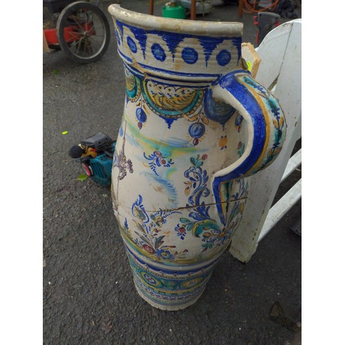 60 - Large Spanish hand painted jug in state of repair