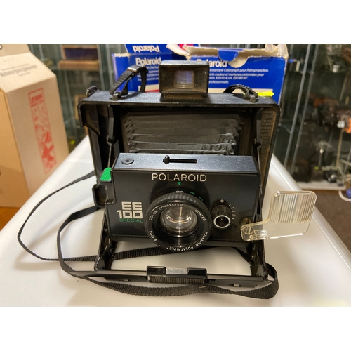 426 - Polaroid EE100 special. Bellows instant camera with two packs of original film 691 (8.5 x 10.5 cm) f... 