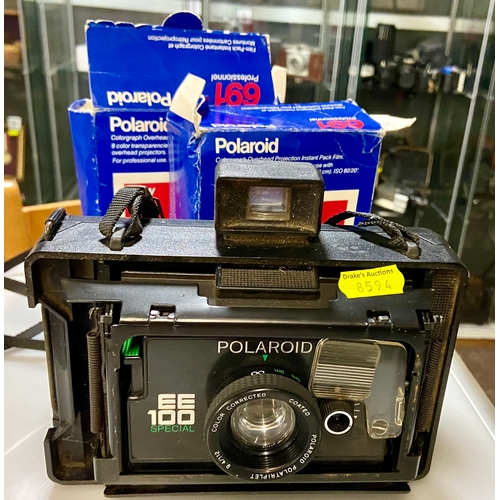 426 - Polaroid EE100 special. Bellows instant camera with two packs of original film 691 (8.5 x 10.5 cm) f... 