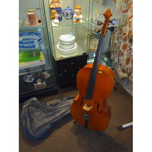 464 - 1/2 size cello with case and two bows.