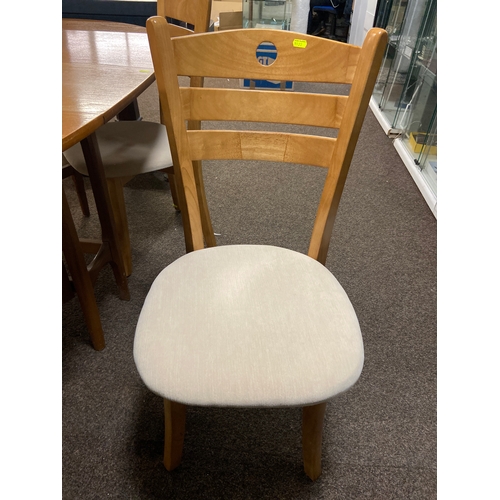 468 - Oval table and four chairs in Nathan style . L167 W98 H74 cm