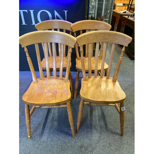 572 - Set of four beech kitchen chairs.