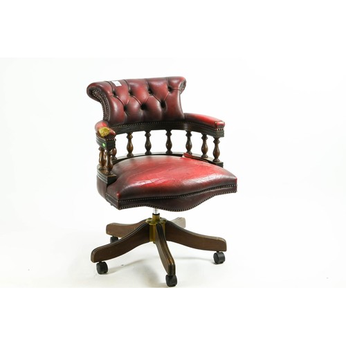 562 - Brights of Nettlebed button back captains chair. Sold as reupholstery project, due to damage to righ... 