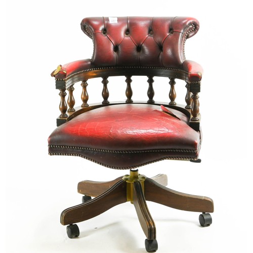 562 - Brights of Nettlebed button back captains chair. Sold as reupholstery project, due to damage to righ... 