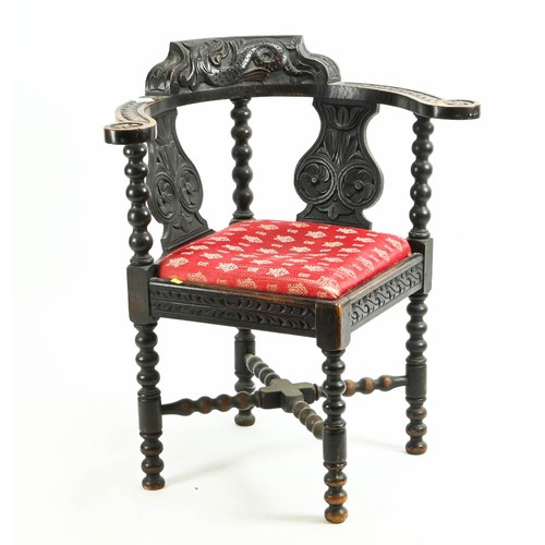 564 - C19 carved oak corner chair