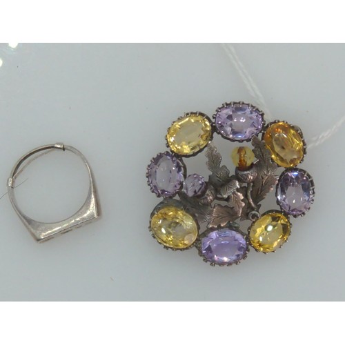 392 - Silver thistle brooch set with amethyst and citrine, together with a silver hallmarked ring, size N,... 