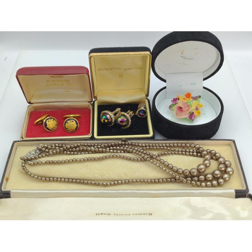 395 - Large collection of assorted jewellery together with two HM silver framed combs