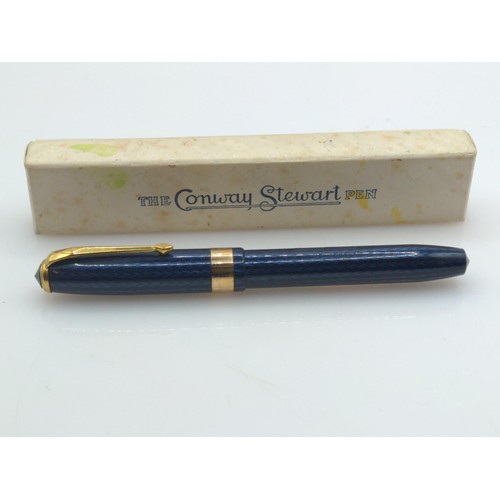 404A - Conway Stewart 27 fountain pen with blue striated design and 14ct gold nib, together with guarantee ... 