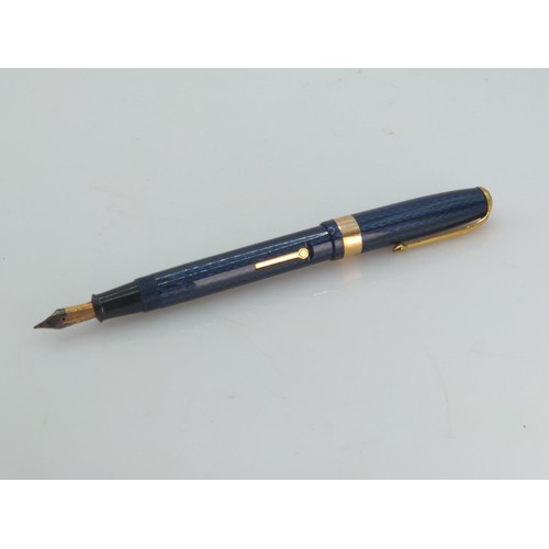 404A - Conway Stewart 27 fountain pen with blue striated design and 14ct gold nib, together with guarantee ... 