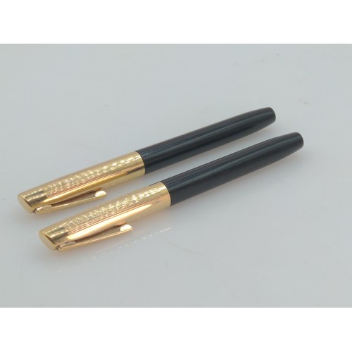 405 - Two Sheaffer's fountain pens with gold coloured lids