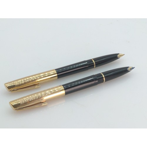 405 - Two Sheaffer's fountain pens with gold coloured lids