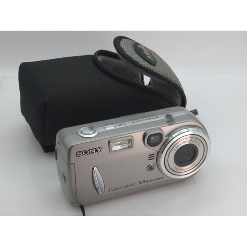 430A - Three cameras including Olympus SZ-31MR, Sony Digital Still Camera, Lumix 20x FullHD, a Sony HC22E h... 