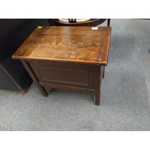 574 - Small oak lidded storage/work box with detail to front W53cm x D34cm x H46cm