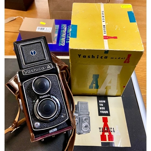 427 - Yashica - A twin lens reflex camera, 120 film (6x6) with Yashicor 80mm f3.5 lens, original case, len... 