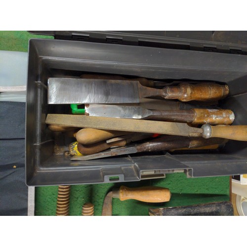 148 - Black plastic tool box Containing some large chisels inc Sorez, Atkin & son + various clamps &am... 