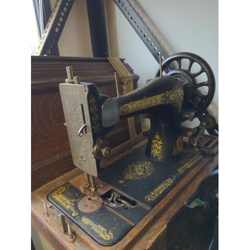 157 - Manual Singer sewing machine in case