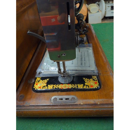 162 - Manual Jones Sewing machine in box