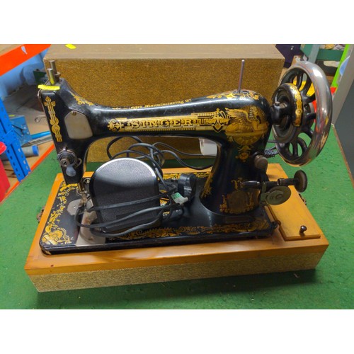 163 - Singer electric sewing machine in case 