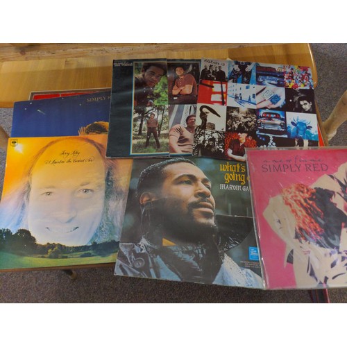 299 - Quantity of vinyl with water damage, Rock & pop collection of Approx. 36 LP's Inc Marvin Gaye, B... 