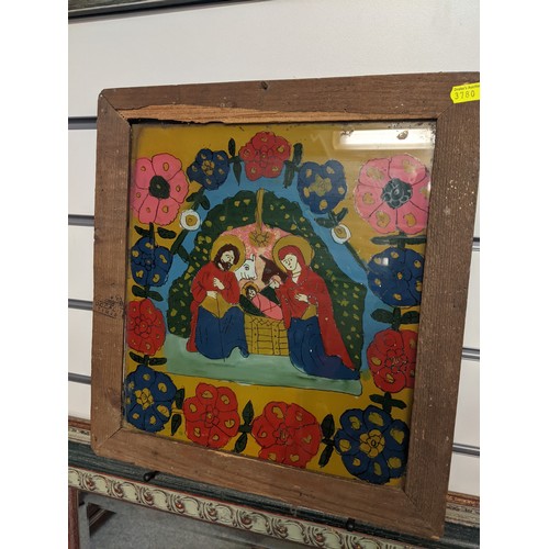 275 - Collection of four framed ecclesiastical artworks: A Romanian nativity scene reverse painted on glas... 