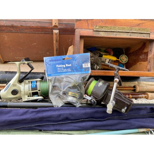 63 - Collection of fishing items: rods, reels, small wooden fishing box, Fenwick, Normark, Sealey etc