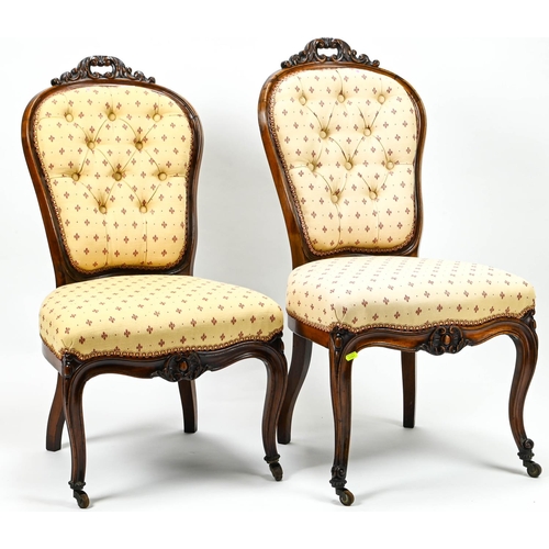 409 - Pair of button back bedroom chairs, raised on castors