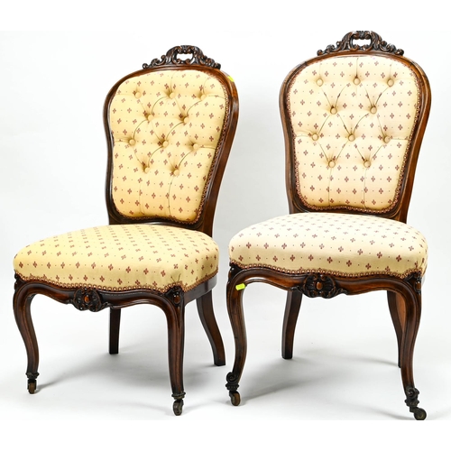 409 - Pair of button back bedroom chairs, raised on castors