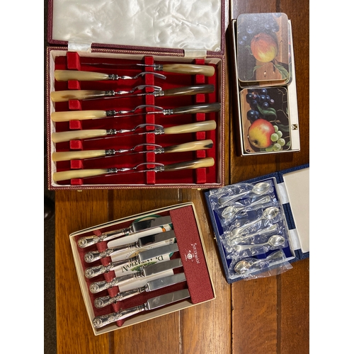 523 - Selection of boxed cutlery and table mats. Inc, steak knives and forks with horn handles, Mappin &am... 