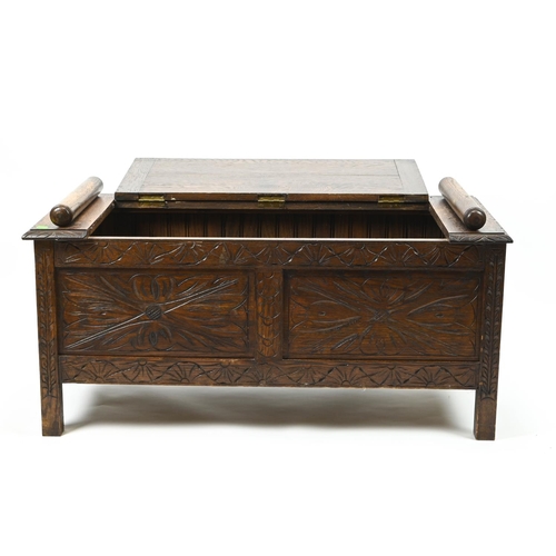 383 - Small carved front oak coffer. W104cm D49cm H52cm