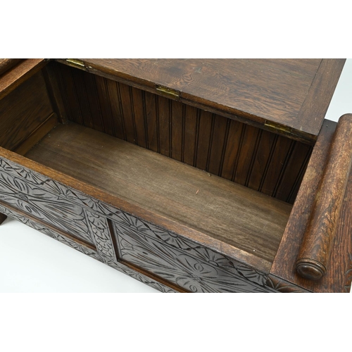 383 - Small carved front oak coffer. W104cm D49cm H52cm